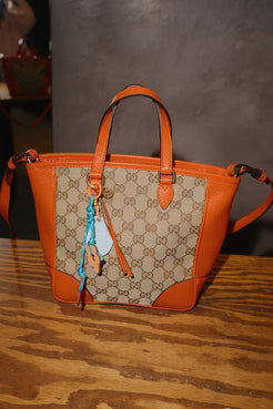 Gucci Orange Monogram Crossover bag