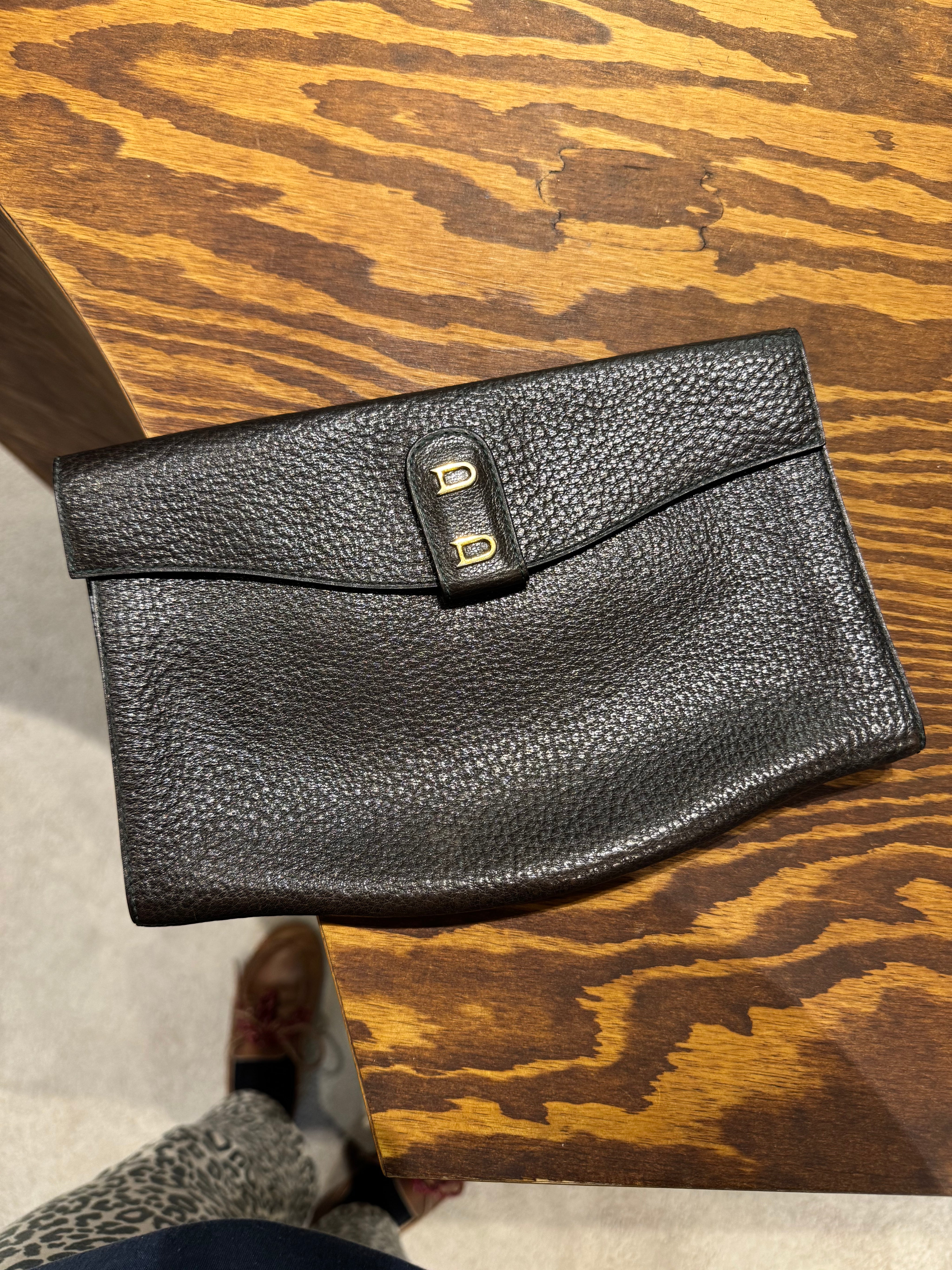 Delvaux brown grained leather clutch