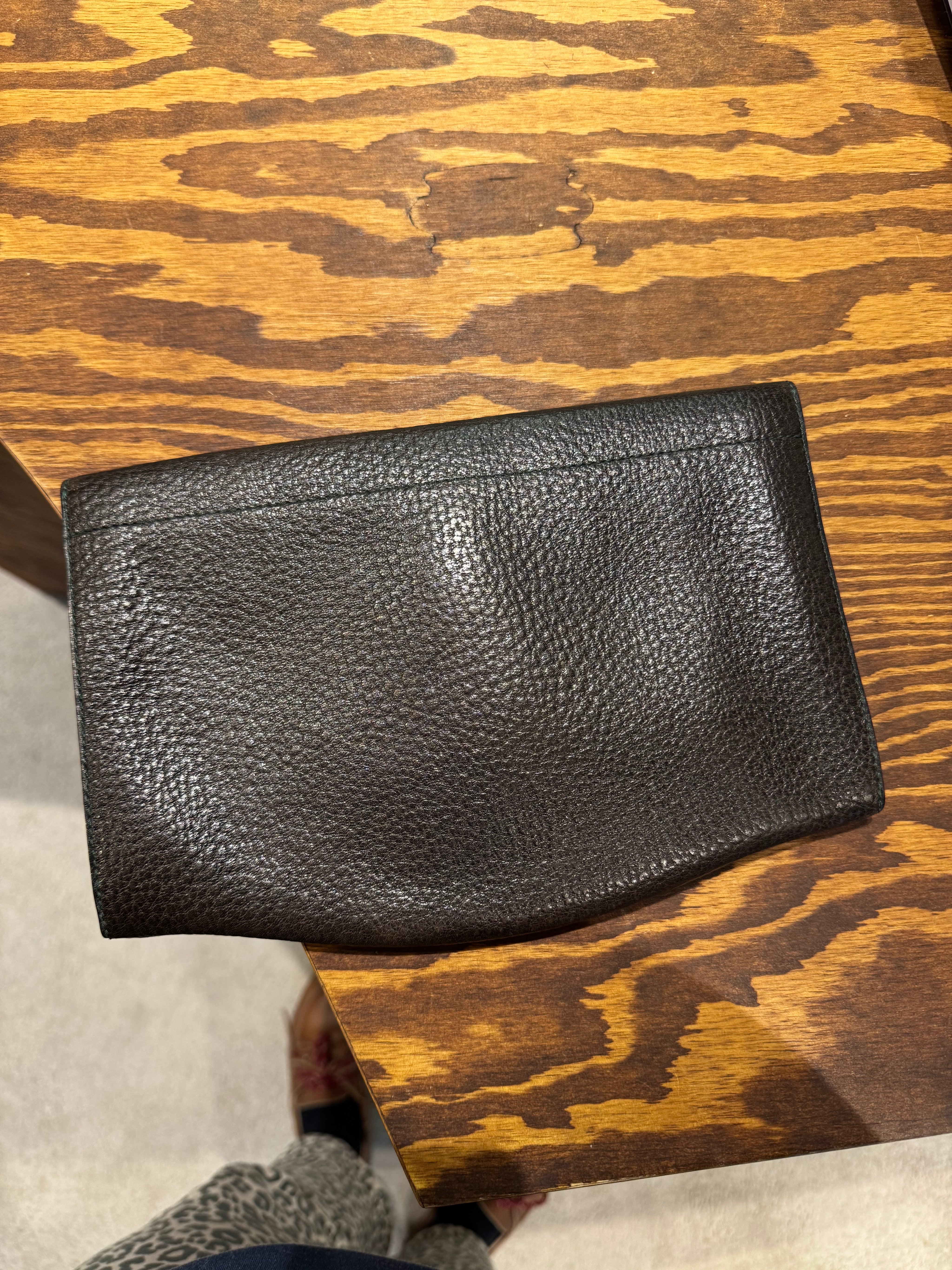 Delvaux brown grained leather clutch