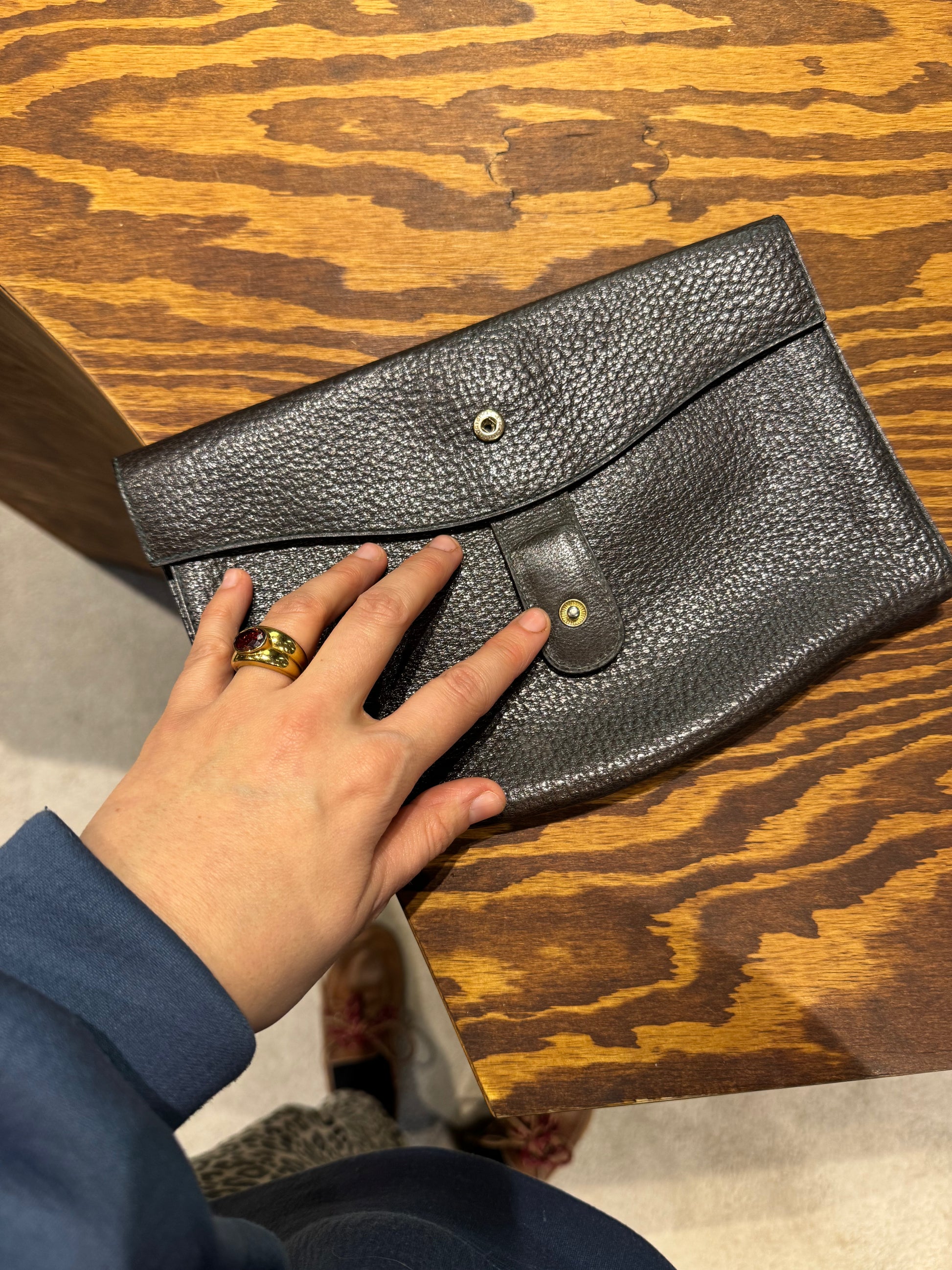 Delvaux brown grained leather clutch