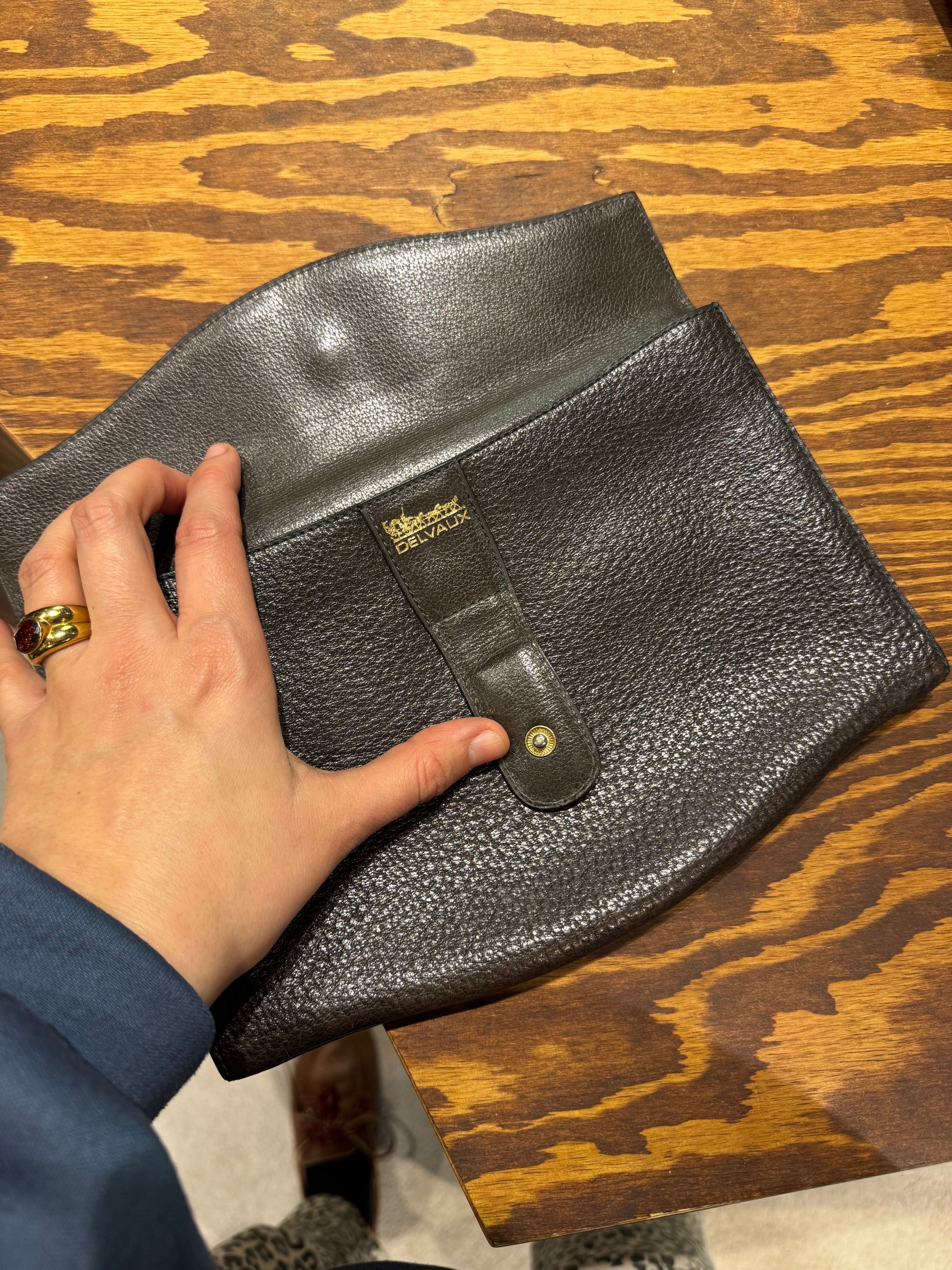 Delvaux brown grained leather clutch