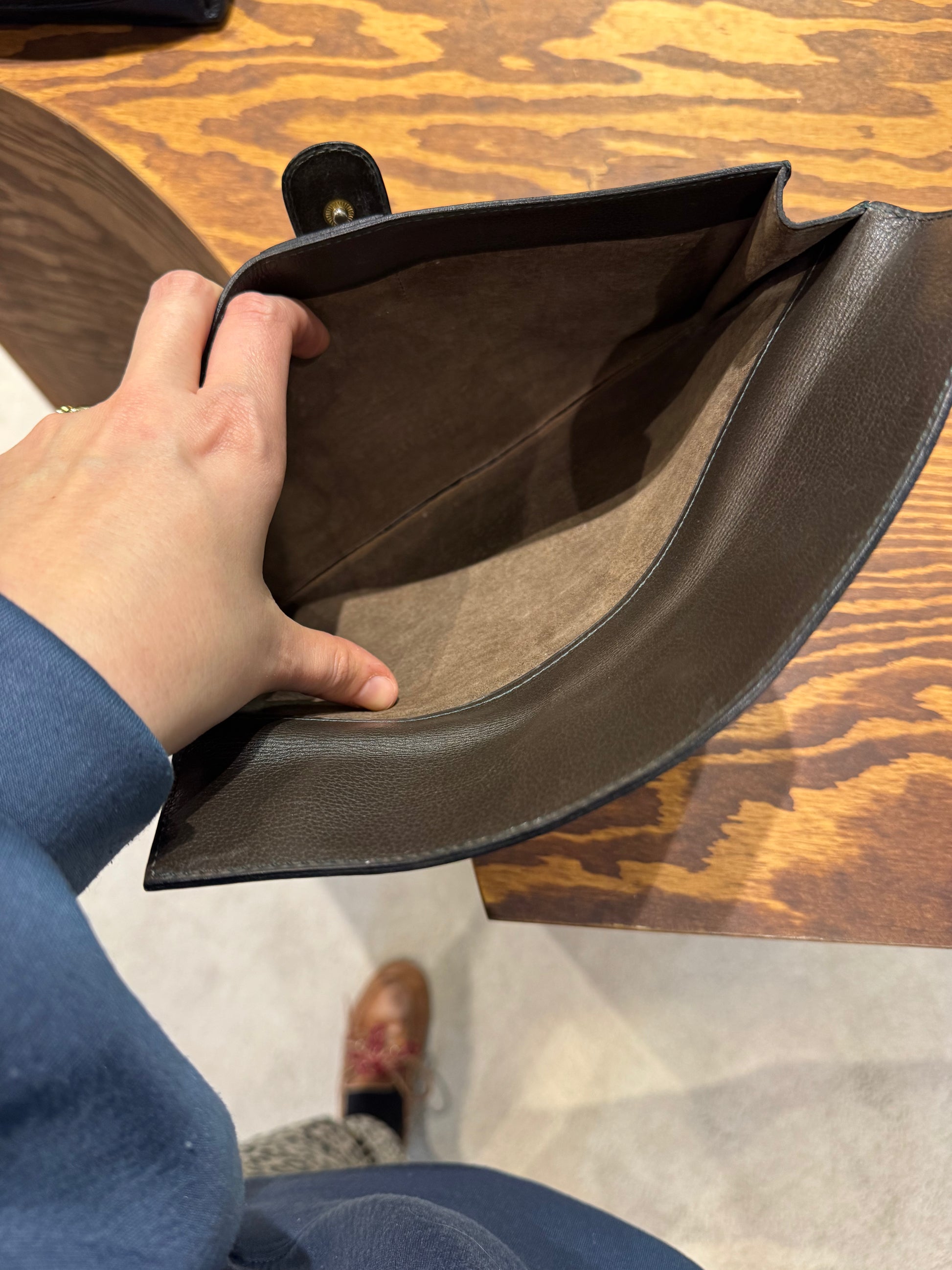 Delvaux brown grained leather clutch