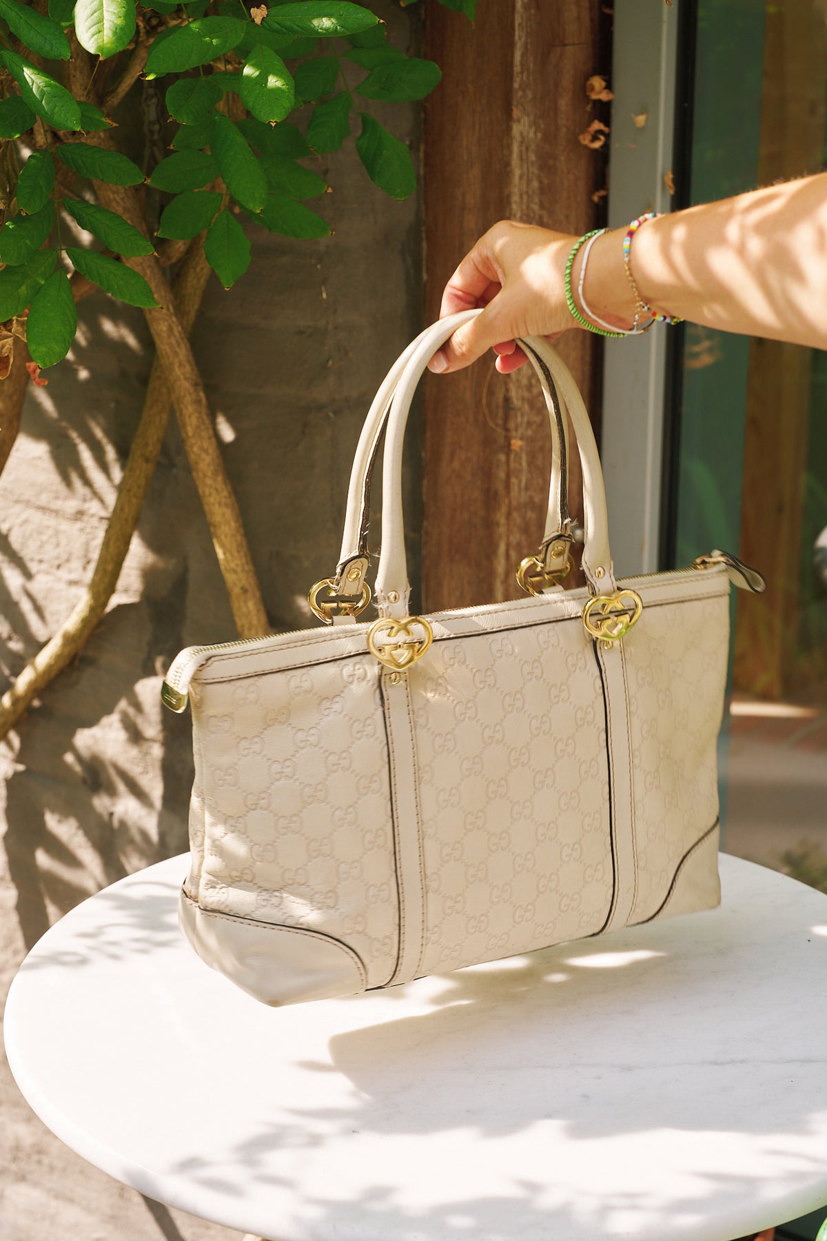 Gucci Embossed Monogram Top Handle Bag