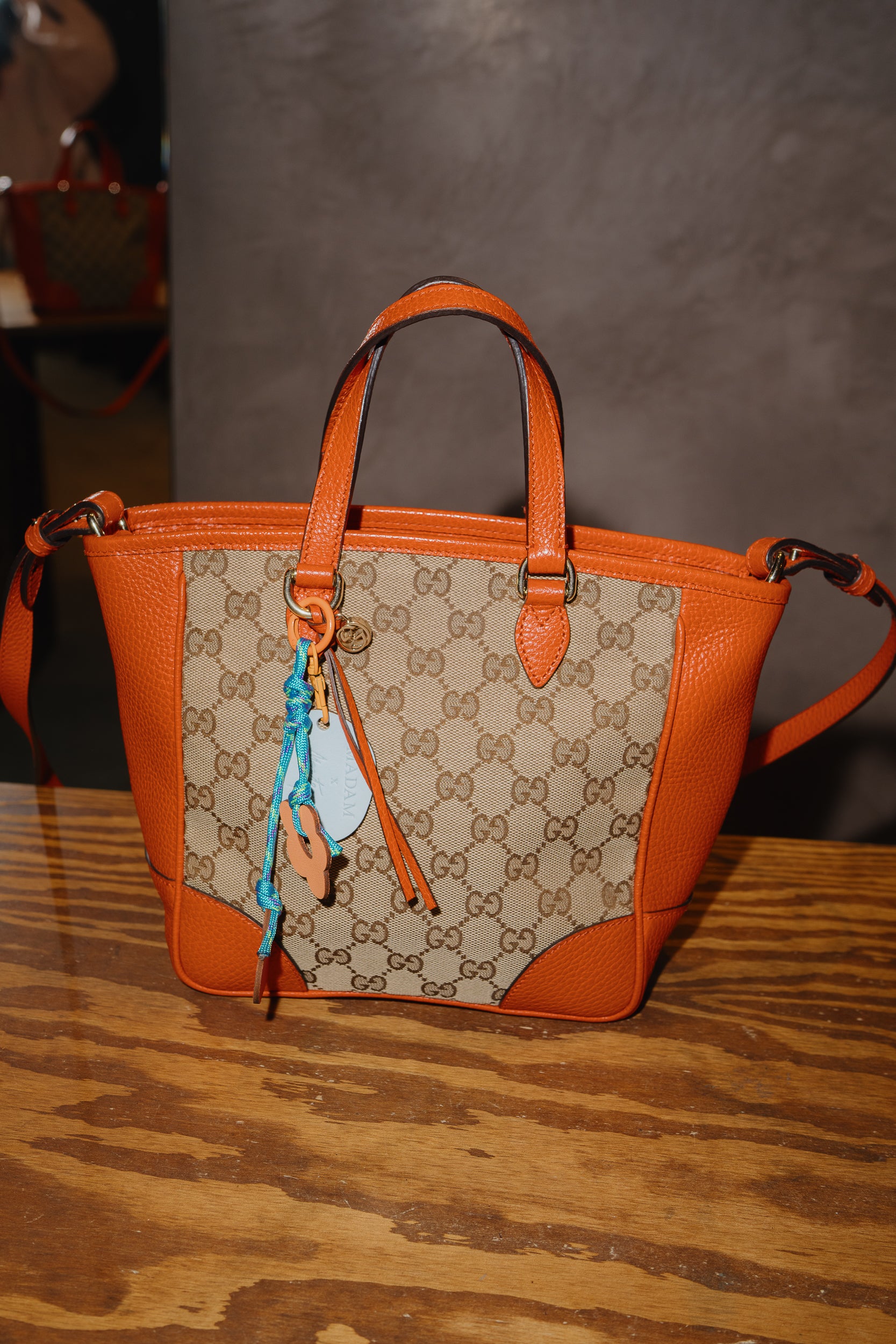 Gucci Orange Monogram Crossover bag