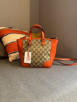 Gucci Orange Monogram Crossover bag