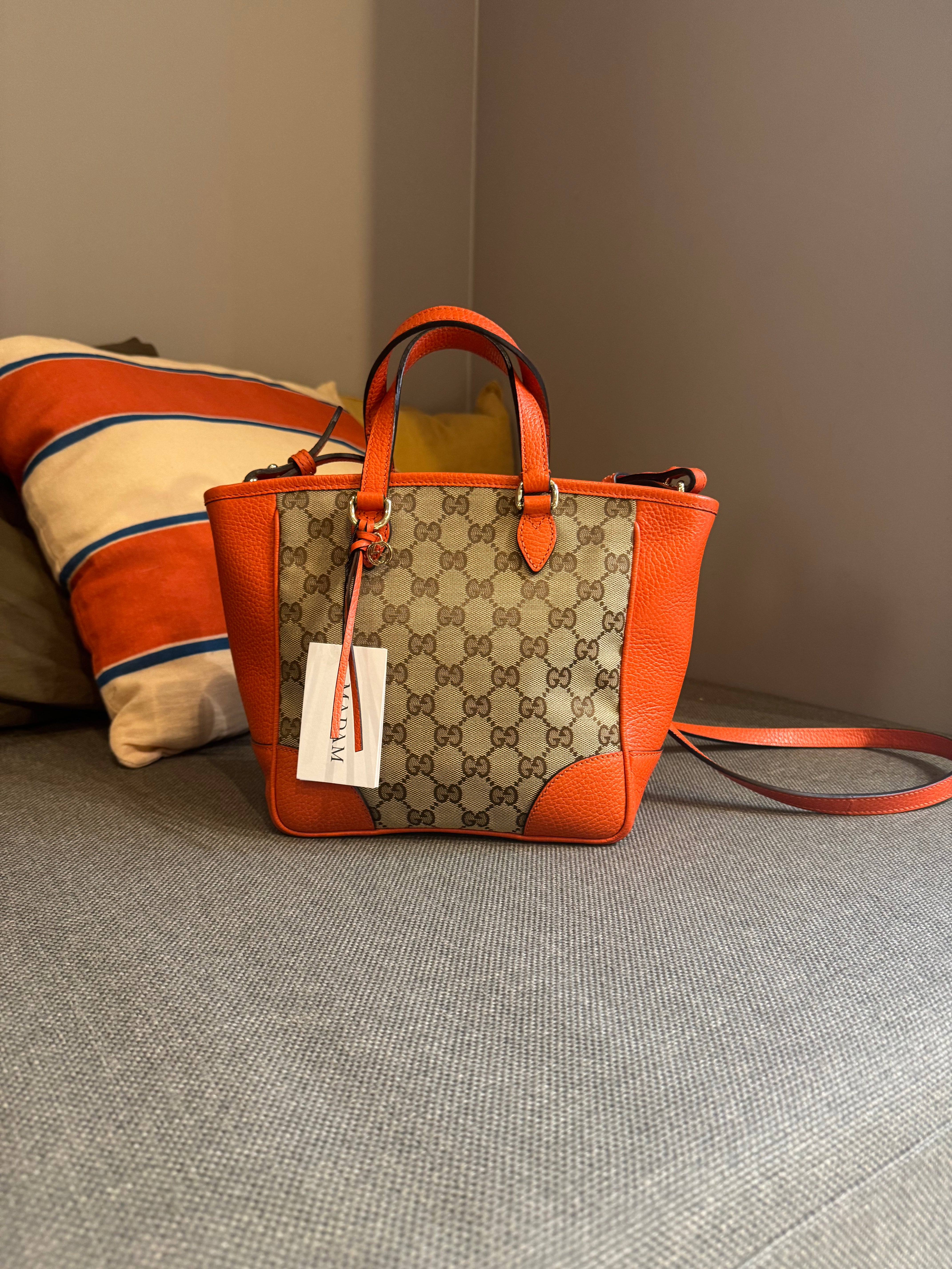 Gucci Orange Monogram Crossover bag