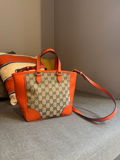 Gucci Orange Monogram Crossover bag