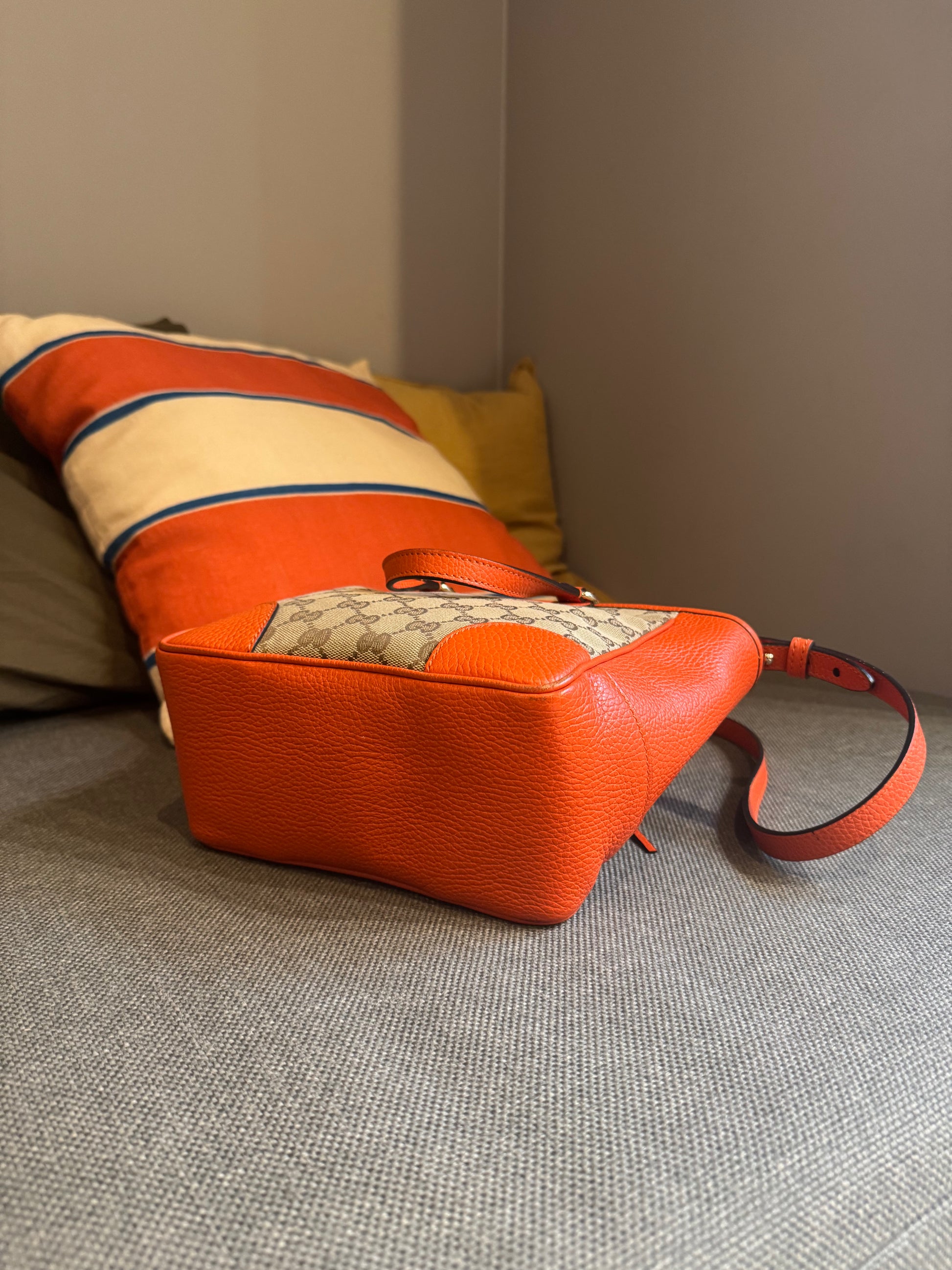 Gucci Orange Monogram Crossover bag