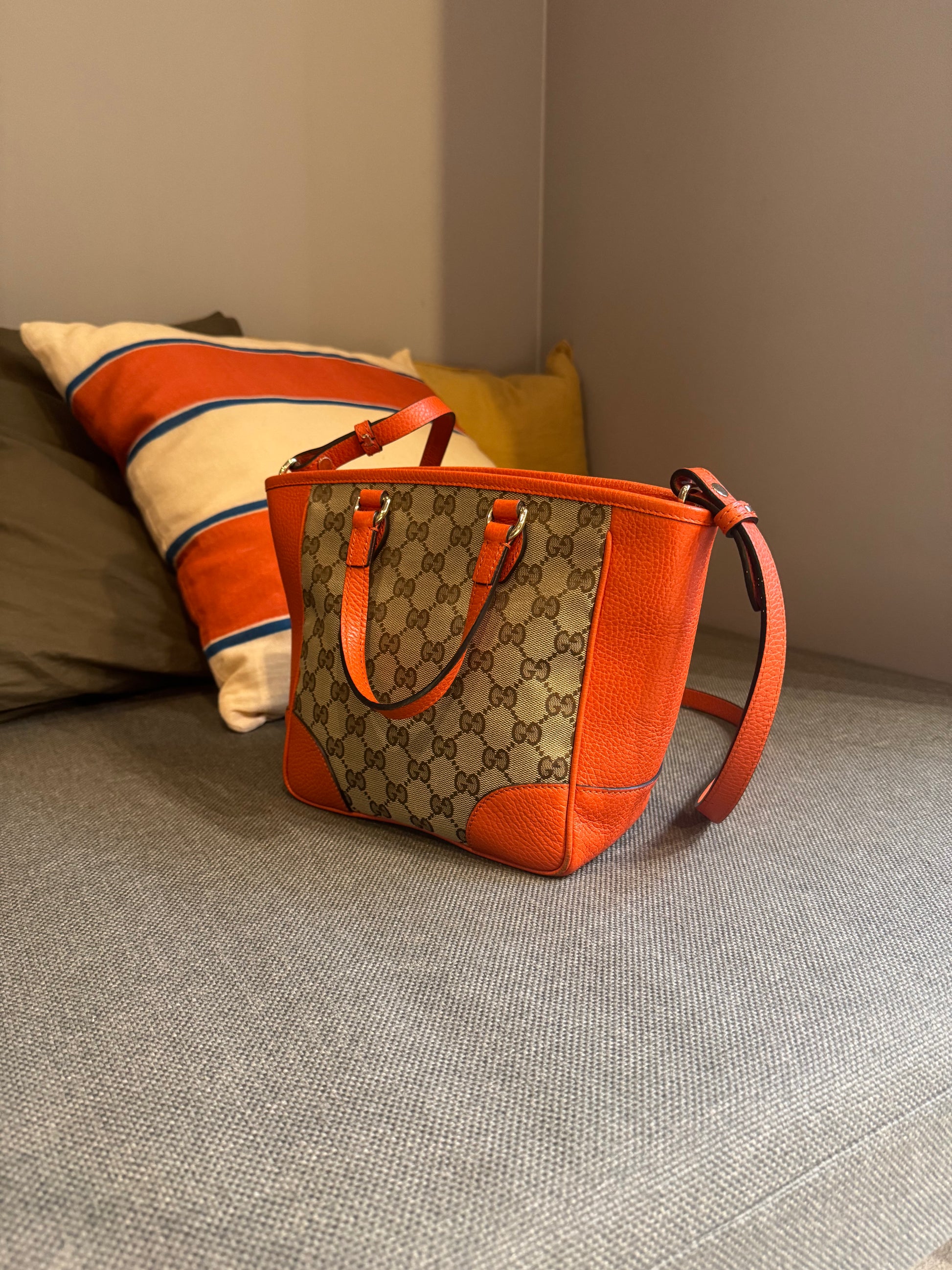 Gucci Orange Monogram Crossover bag