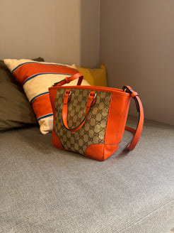 Gucci Orange Monogram Crossover bag