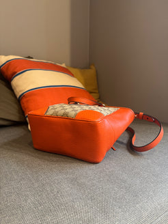 Gucci Orange Monogram Crossover bag