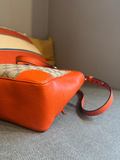 Gucci Orange Monogram Crossover bag