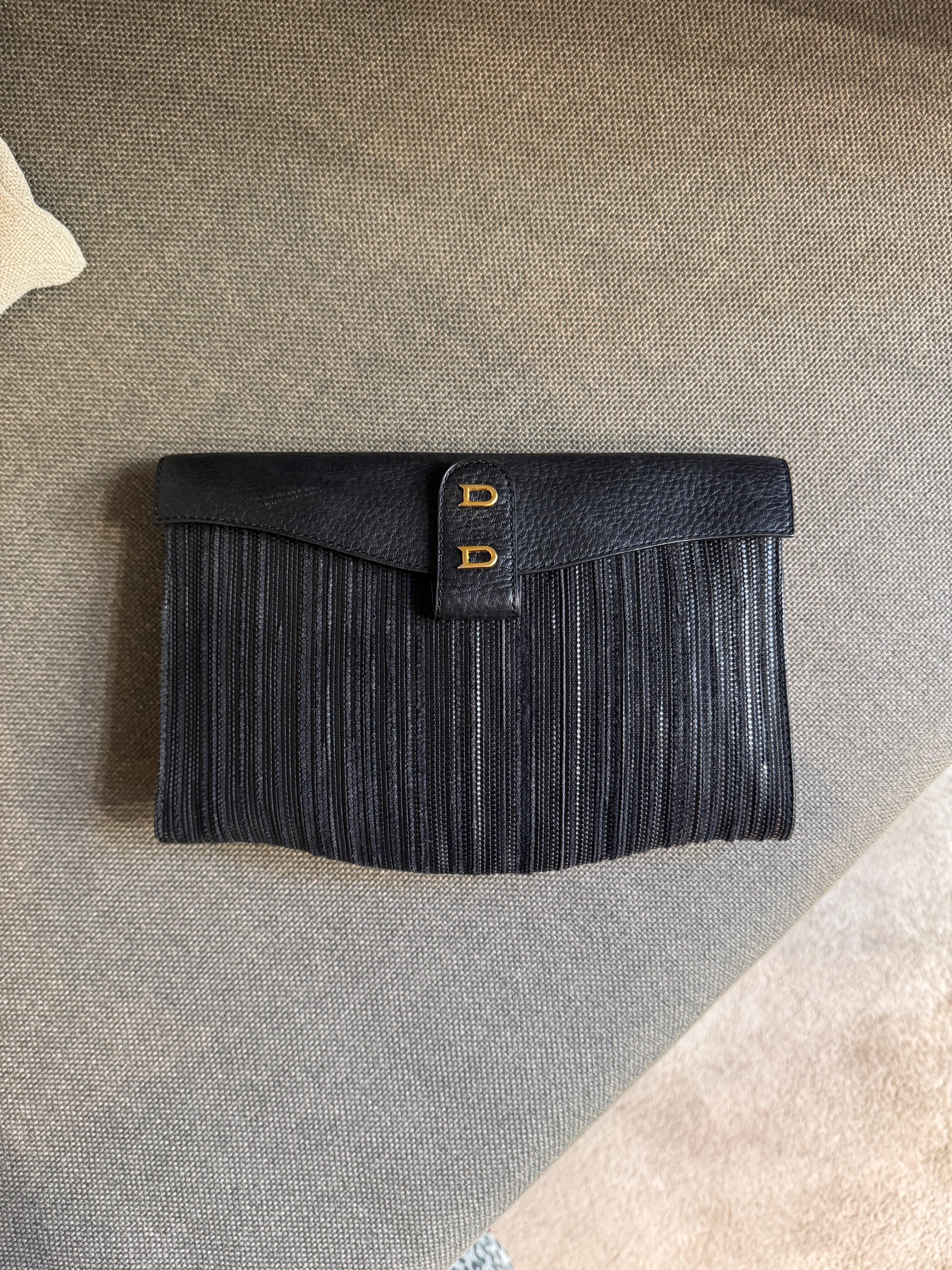 Delvaux Pochette in Black Toile de Cuir