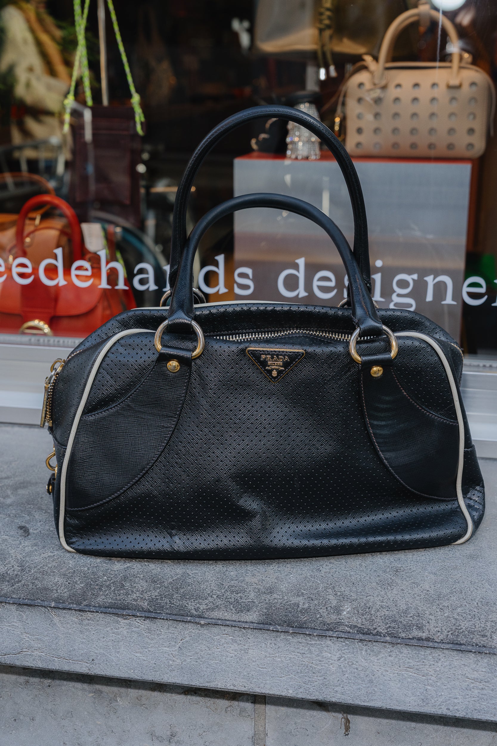 Prada Perforated Bowling Bag