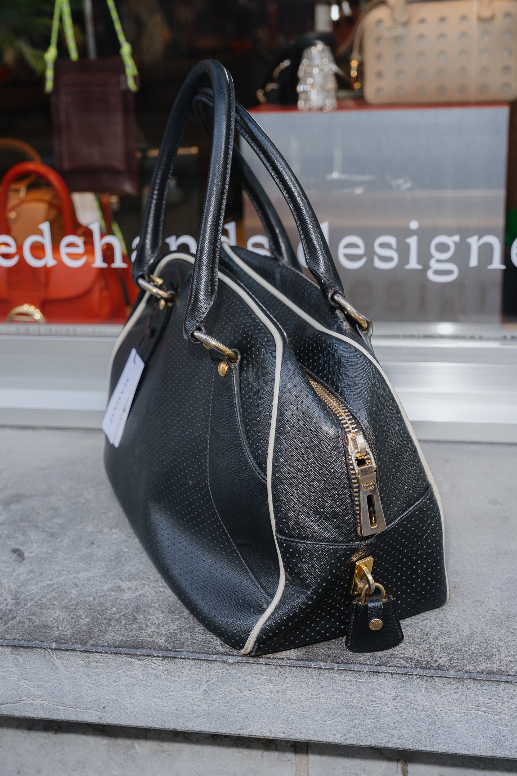 Prada Perforated Bowling Bag