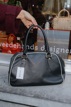 Prada Perforated Bowling Bag