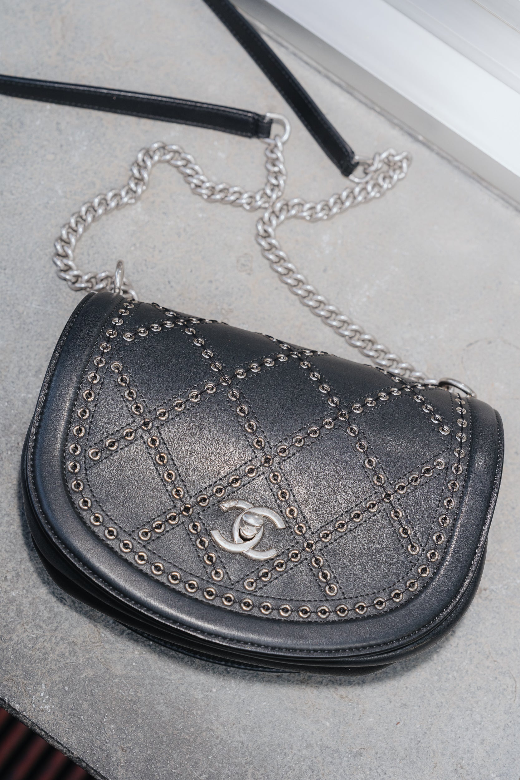 chanel Coco Eyelets Round Flap Bag