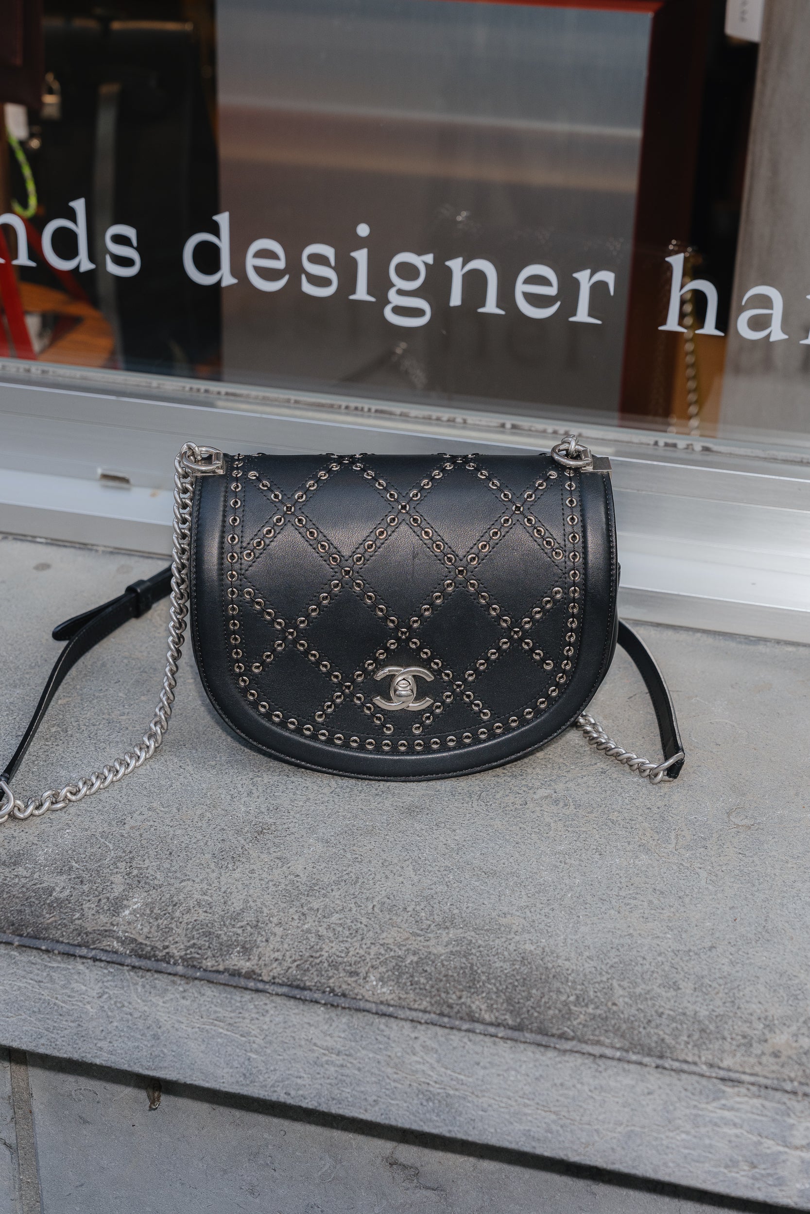 chanel Coco Eyelets Round Flap Bag